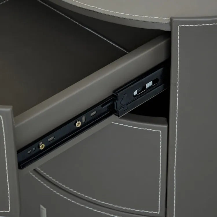 Sleek Round Bedside Cupboard with Synthetic Leather Finish and Ample Storage hms-4073