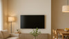 Editorial living-dining room showing function-led placement of a sofa, storage media console, and dining table in warm natural light.