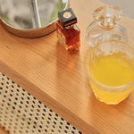 Elegant Cherry Wood Bedside Cupboard with Glass and Rattan Accents fyg-676