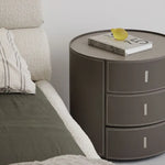Sleek Round Bedside Cupboard with Synthetic Leather Finish and Ample Storage hms-4073