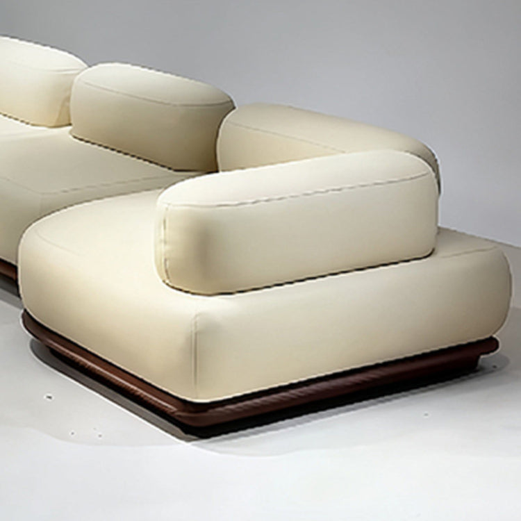 Italian Modern Minimalist Curved Solid Wood Leather Sofa, Soft Cream-Tone Luxury Couch sz-0207-46